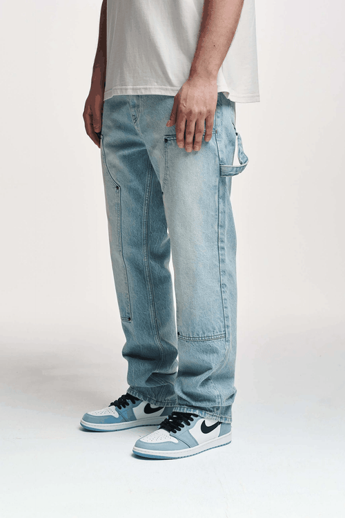 Pantalones Carpenter denim azul de algodón con fit relajado estilo streetwear y workwear.
